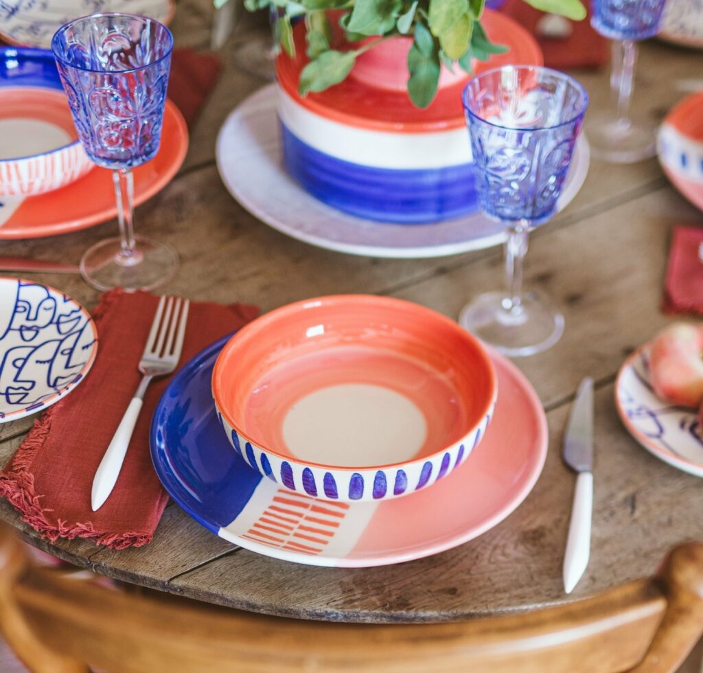 vietri table setting, red white and blue plates and bowls