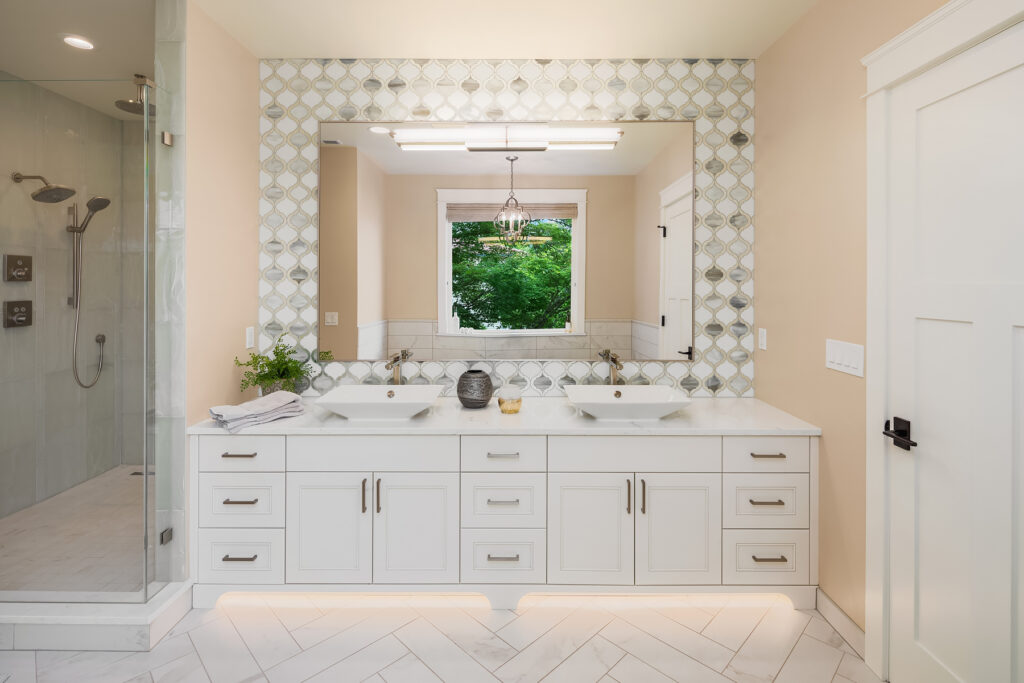 double vanity in bathroom with custom tile
