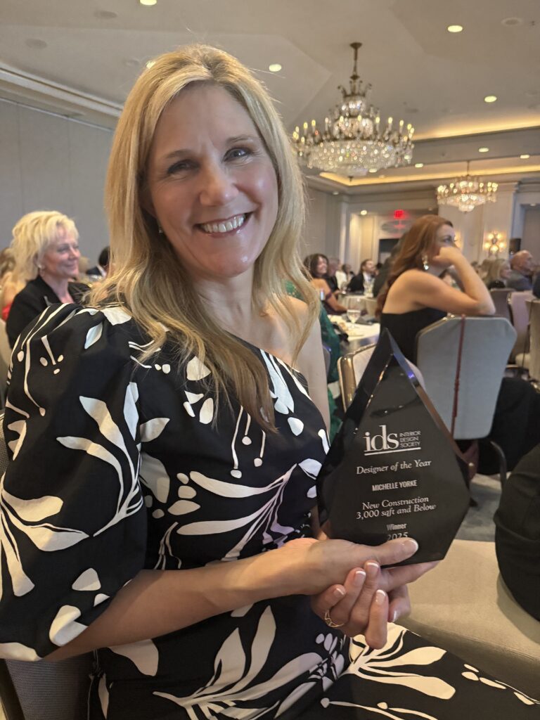 Michelle Yorke Interior Design holding the award for IDS Designer of Year for her Suncadia mountain home.