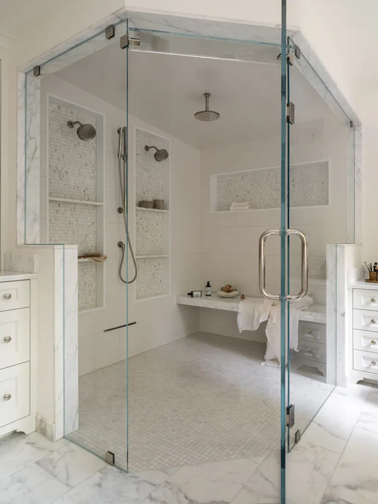 large walk in glass shower with dual shower heads